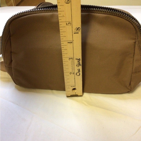 Tan Crossbody Bag with Adjustable Strap and Durable Fabric - Picture 6 of 9